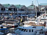 Harbor with shopping mall in background  Cape Town, South Africa