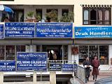 Thimphu shops  The blue signs with white lettering meet government standards, though some shops have broken out of that mold.