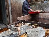 Preparing the bark for paper  The next images are at a paper factory where paper is hand made from the inner bark of the Daphne.