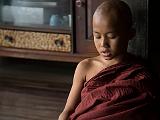 Young monk studying  I closed my eyes and meditated briefly to the students droning their lessons.  Great beginning to the Buddhist bent of the trip.