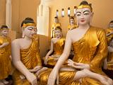 Shwedagon Buddhas  The Shwedagon Pagoda and its many surrounding smaller pagodas, stupas, and shrines form the most sacred place for Myanmar Buddhists.  This is a room of large Budda figures.