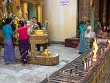 Bathing the Buddha  From a Hindu custom, Buddhists poor water over the statue of the Buddha to gain karma favor.