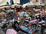 Motorcycles at a market