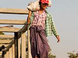 Construction worker  Pipes are laid down to the Yangon River edge for sand extraction.