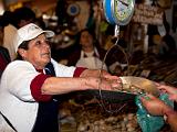 Weighing clams  Valparaiso, Chile
